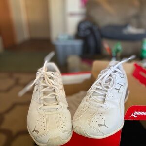 Puma White Sneakers with Sleek Design and Breathable Perforated Sides